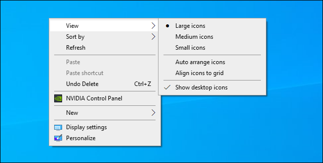 اختيار Windows حجم رمز سطح المكتب من قائمة سياق سطح المكتب.