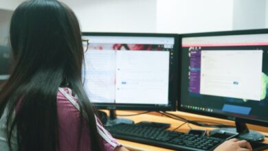 Woman using a desktop computer