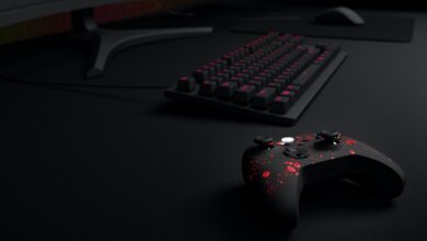 photo of controller and keyboard on a desk