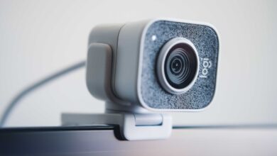 White Logitech Webcam on Monitor
