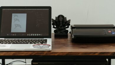 Printer beside a laptop