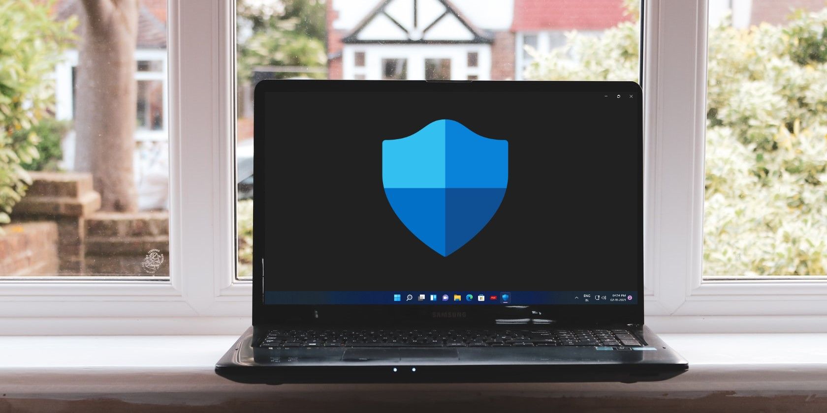 Windows Laptop with Microsoft Defender Logo on Screen
